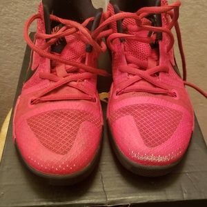Boys red Kyrie tennis shoes